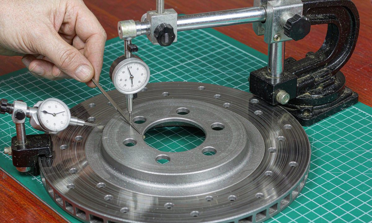 Checking brake disc runout with a dial indicator